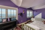 Second floor guest room with two twin beds.